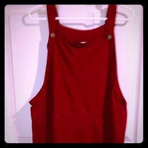 Dark red poly jumper.